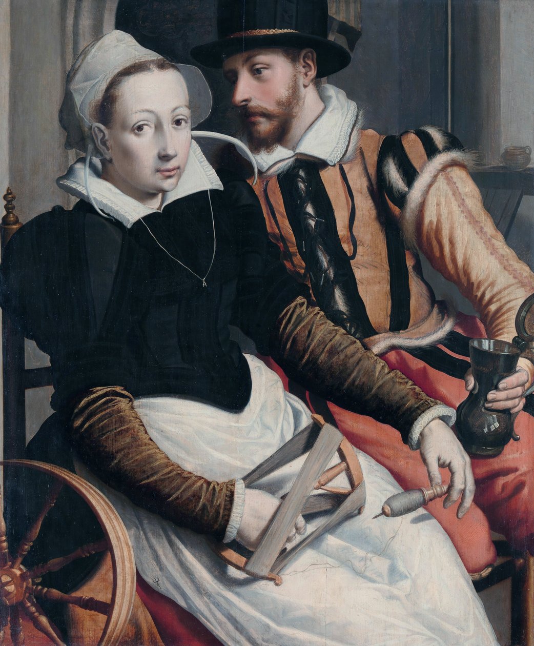 A woman at the spinning wheel and a man with a mug seated in an interior. av Pieter Pietersz the Elder