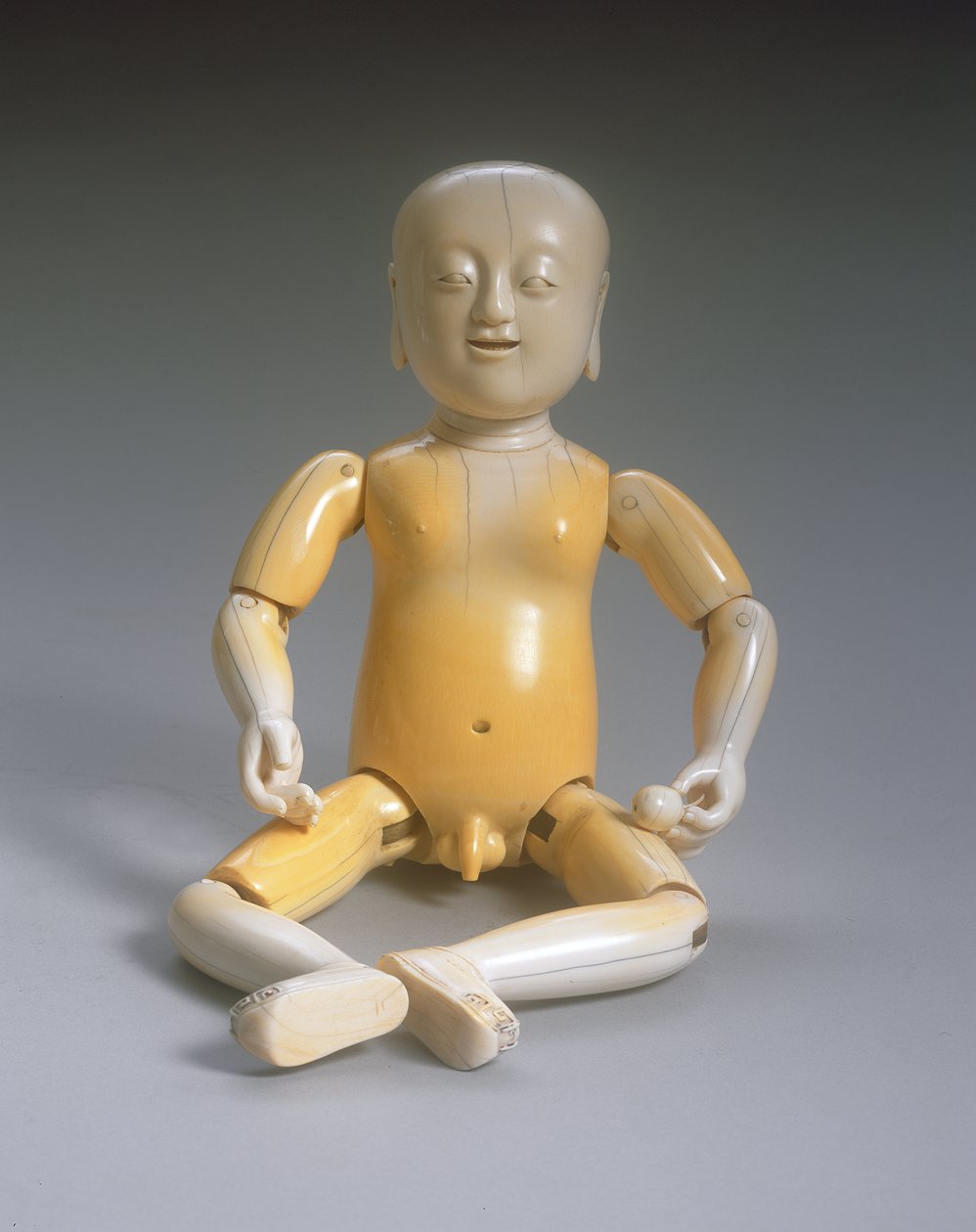 Ledad figur av en pojke, Kangxi-perioden (1662-1722) (se även 272188) av Qing Dynasty Chinese School