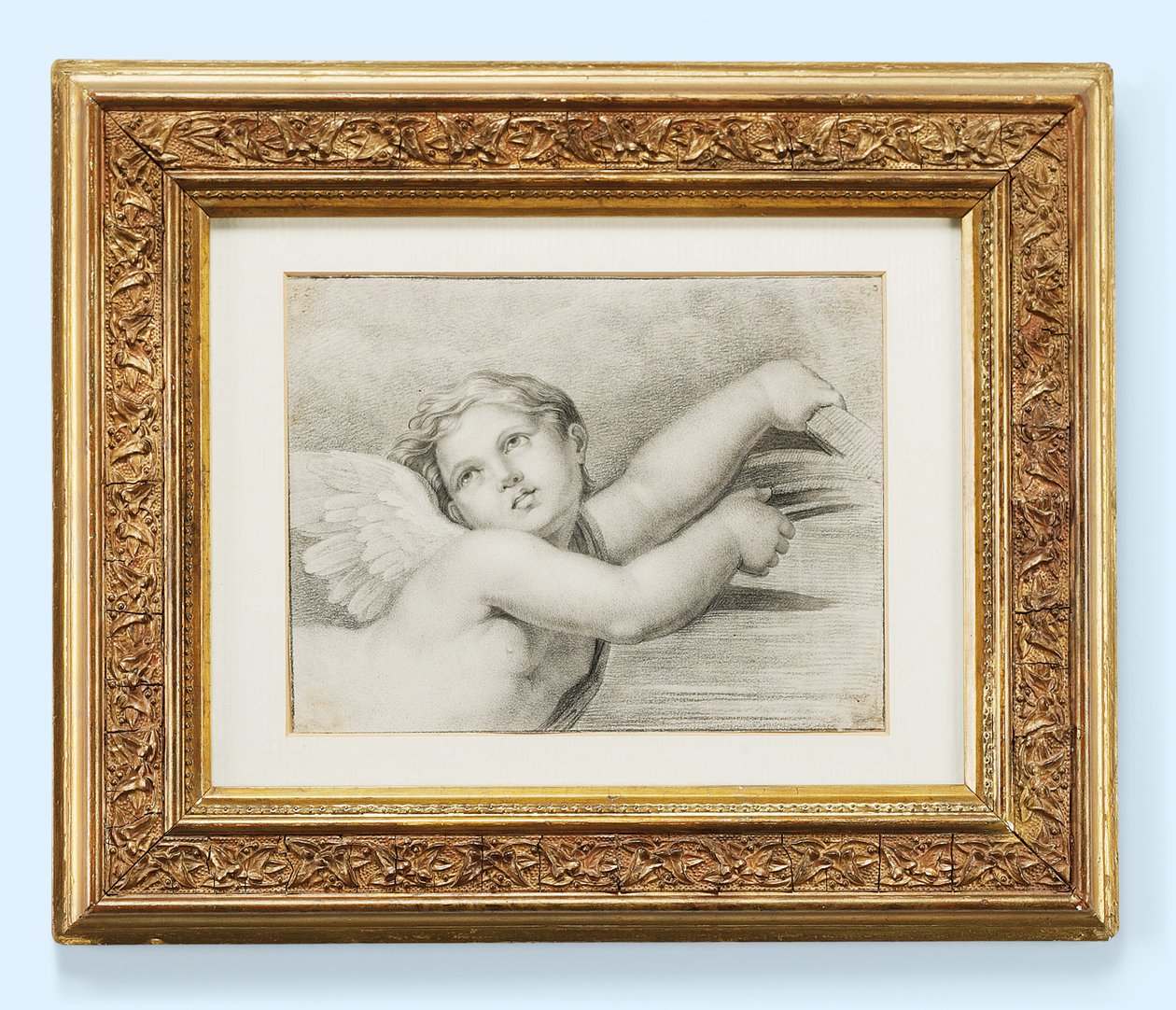 Huvud av en putto (svart krita på papper) av after Raphael