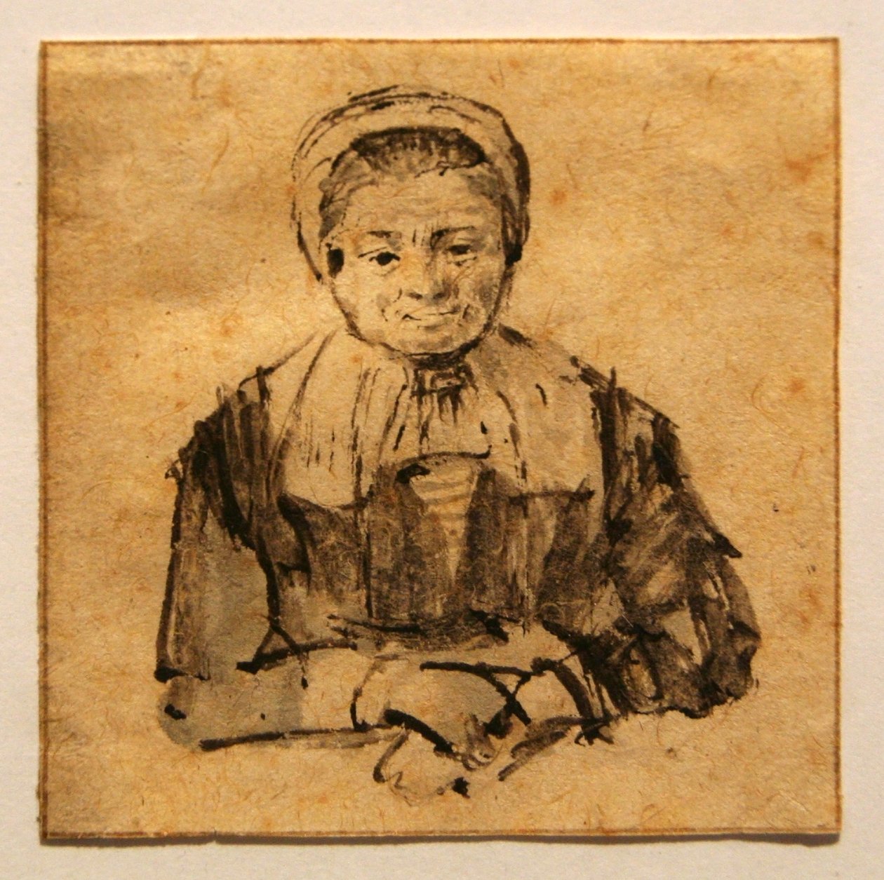 Oude vrouw met gevouwen handen av Rembrandt van Rijn