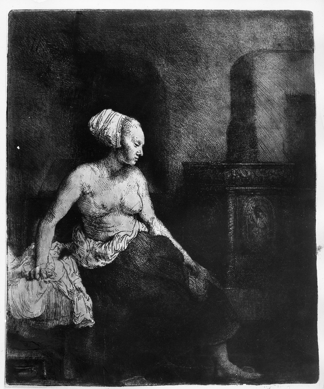 Mwanamke ameketi nusu-amevaa kando ya jiko, 1658 swed av Rembrandt van Rijn