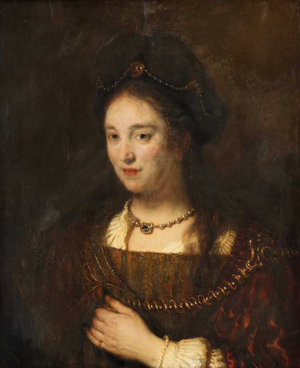 Halvfigur av en kvinna med basker av Rembrandt