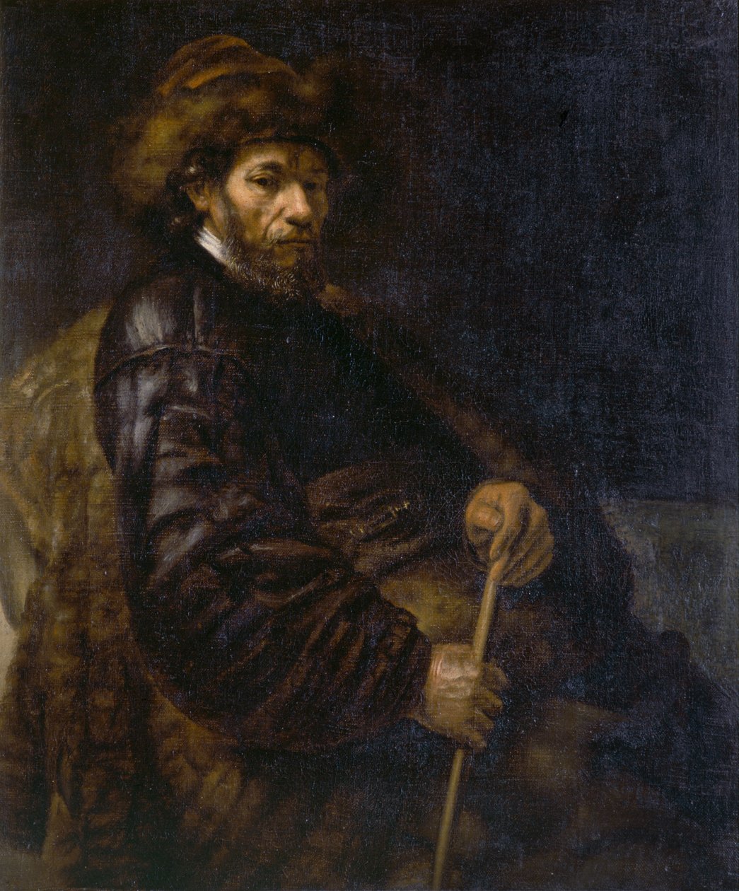 En sittande man med en pinne (olja på duk) av Rembrandt Harmensz. van Rijn