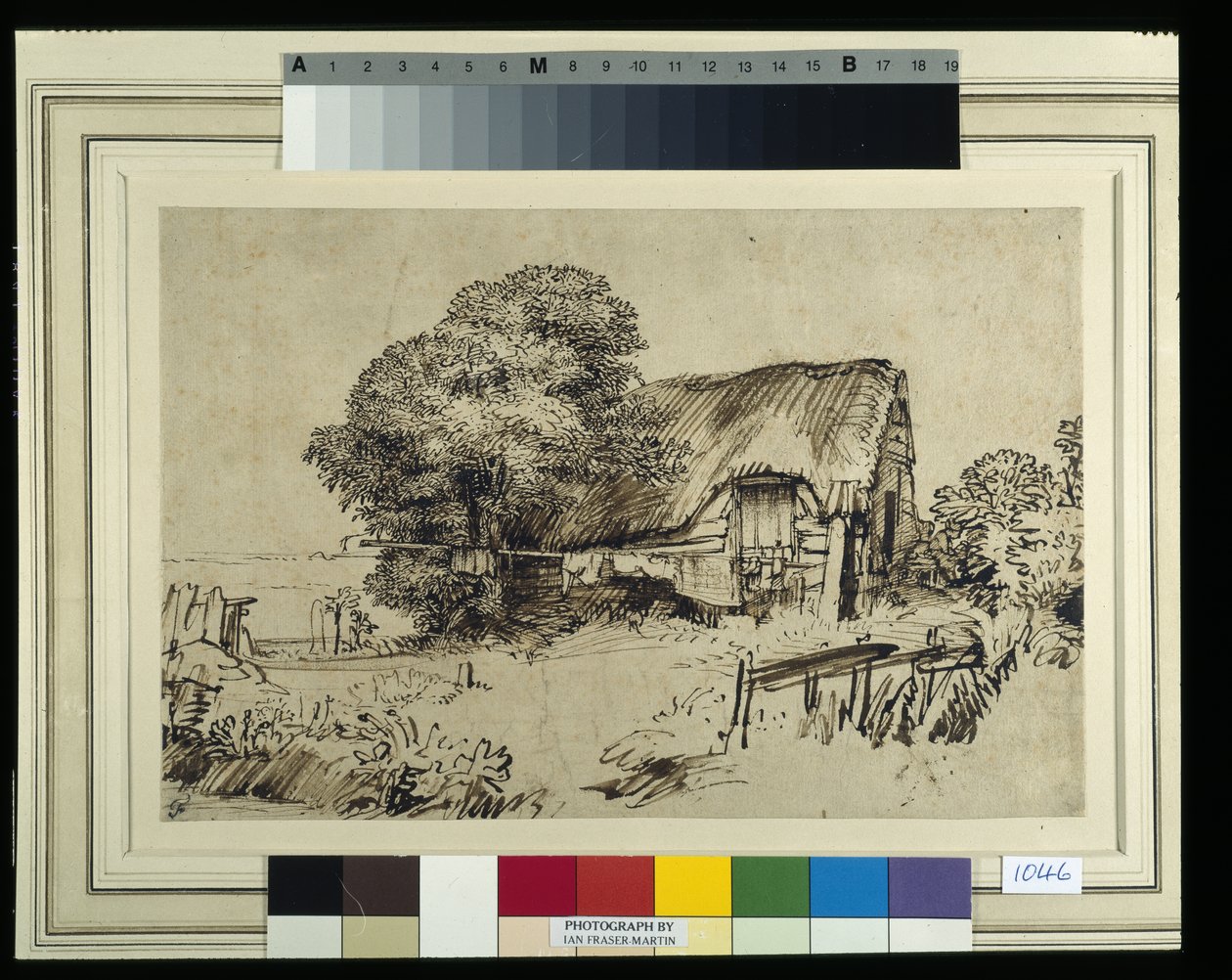 En stuga med halmtak vid ett stort träd, en figur som sitter utanför, ca 1648-52 (penna och bläck på papper) av Rembrandt Harmensz. van Rijn