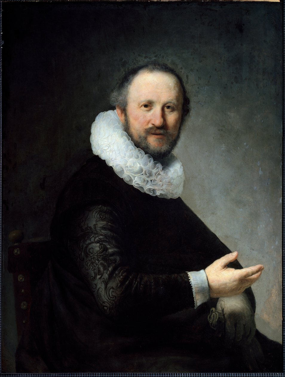 Holländsk Bourgeois håller sina handskar, bär en ruff. (Målning av Rembrandt van Rijn