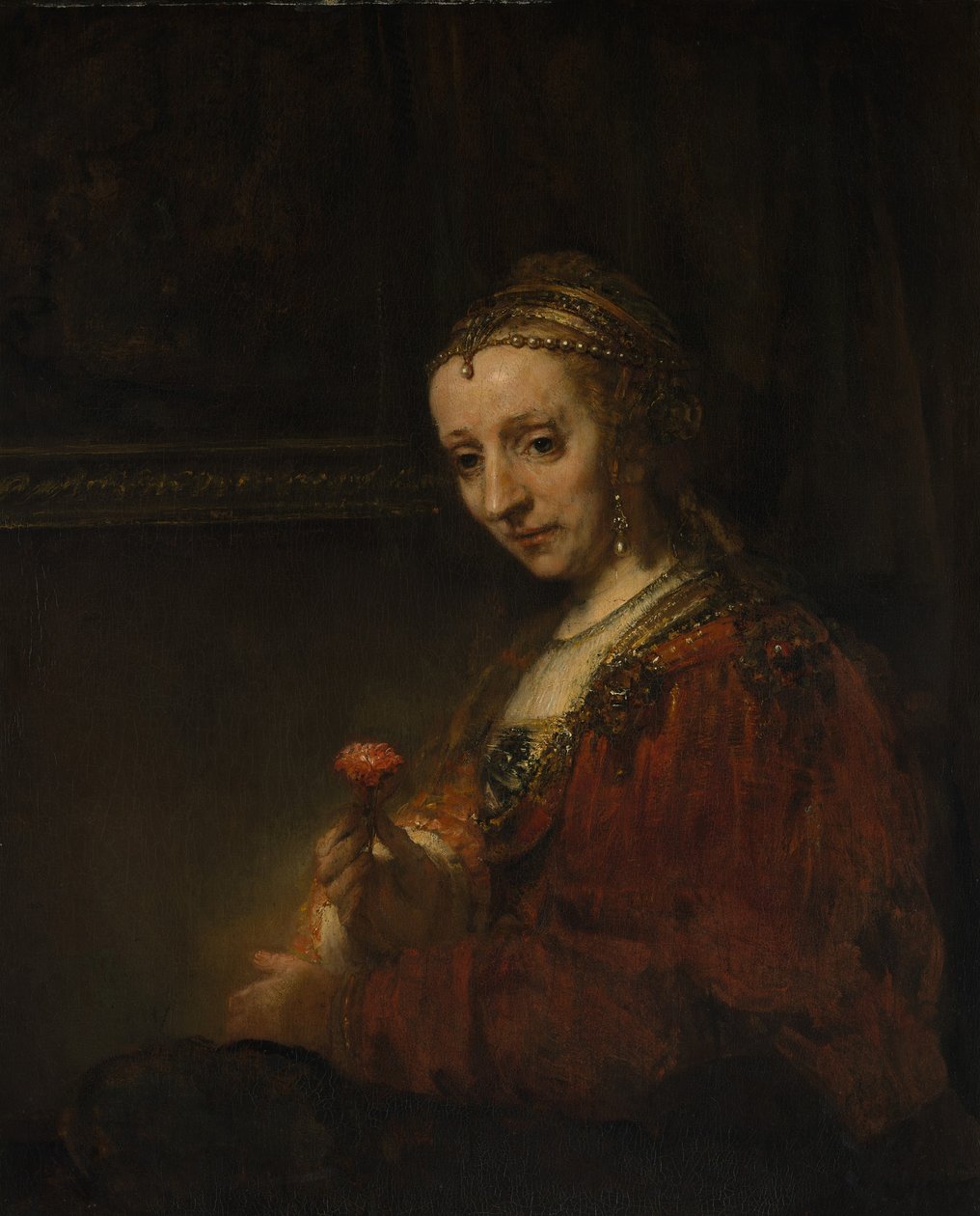 Woman with a Pink, c.1660 (olja på duk) av Rembrandt van Rijn