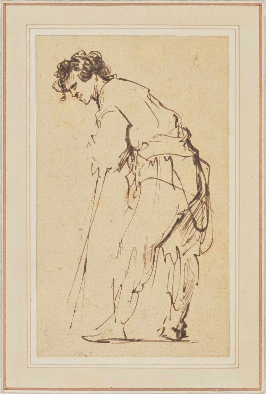 Ung man lutar sig på en pinne av Rembrandt Harmensz. van Rijn