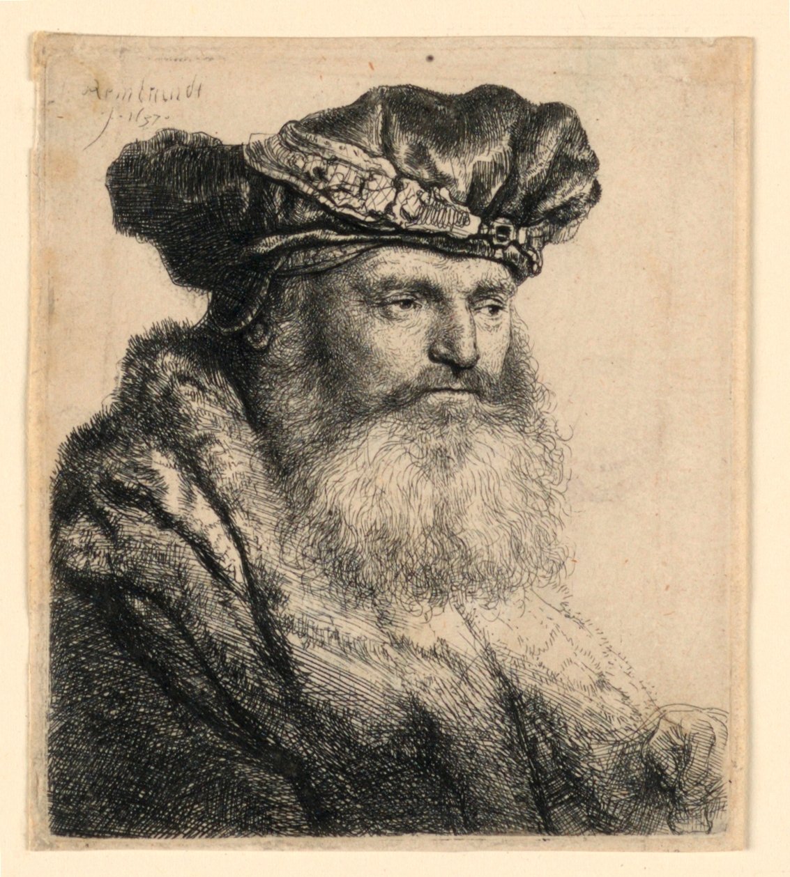 En skäggig man som bär en sammetsmössa med ett juvellås av Rembrandt van Rijn