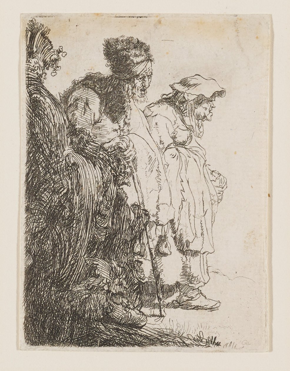 En tiggare och en tiggarkvinna bakom en bank av Rembrandt van Rijn