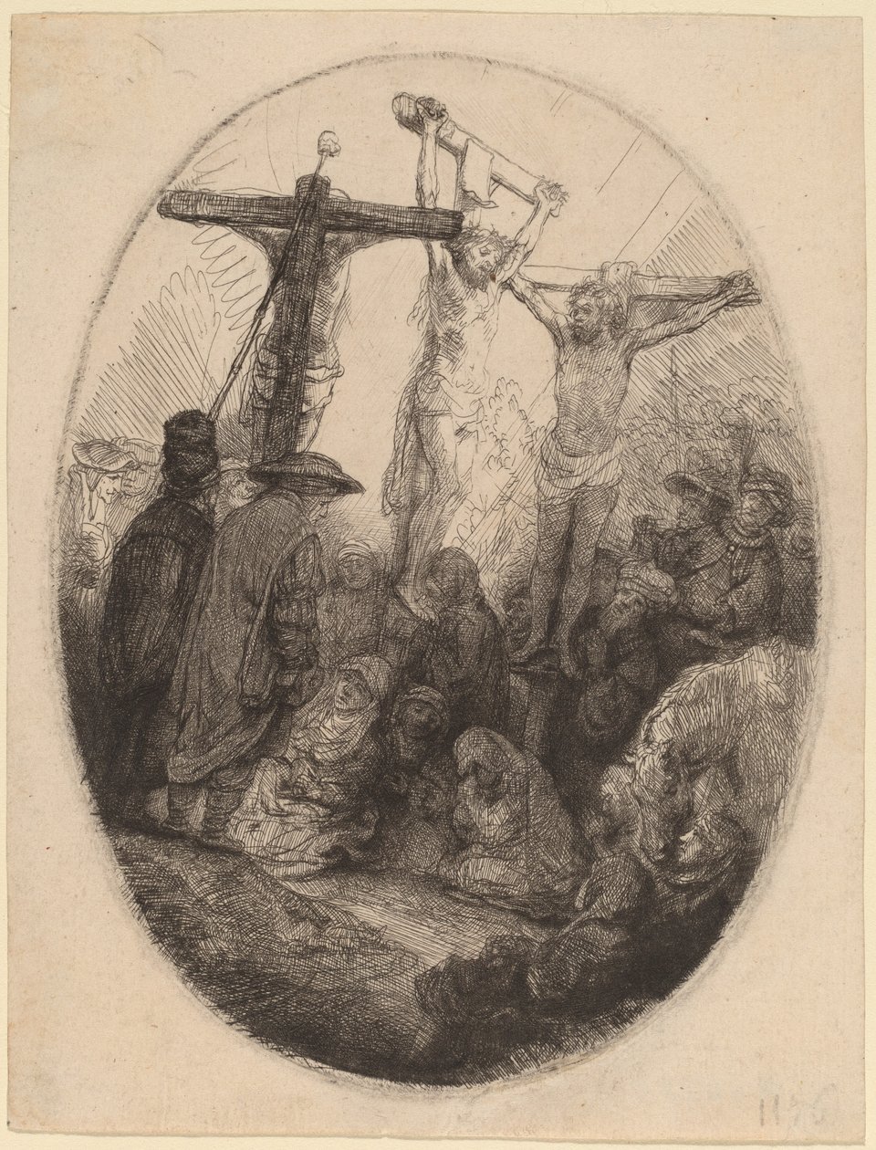 Kristus korsfäst mellan de två tjuvarna: en oval tallrik av Rembrandt van Rijn