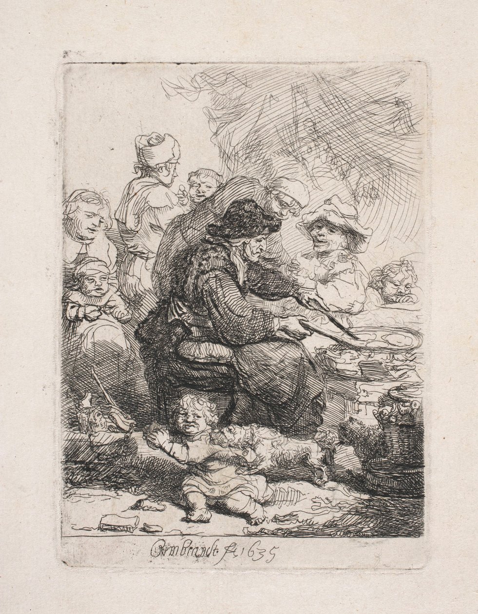 En kvinna som steker pannkakor av Rembrandt van Rijn