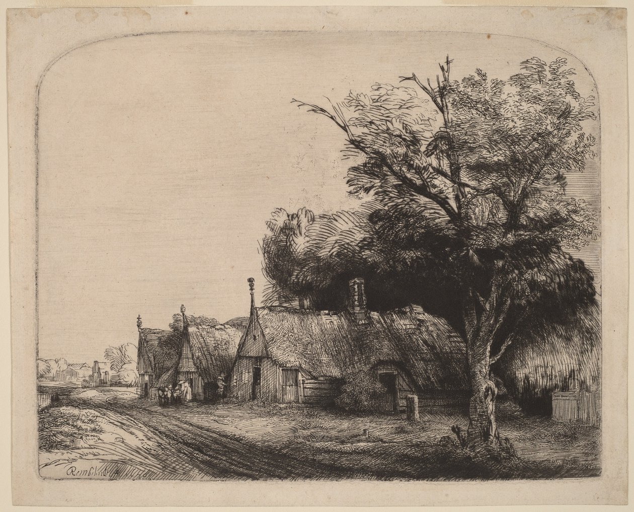 Landskap med tre stugor med sadeltak vid en väg av Rembrandt van Rijn