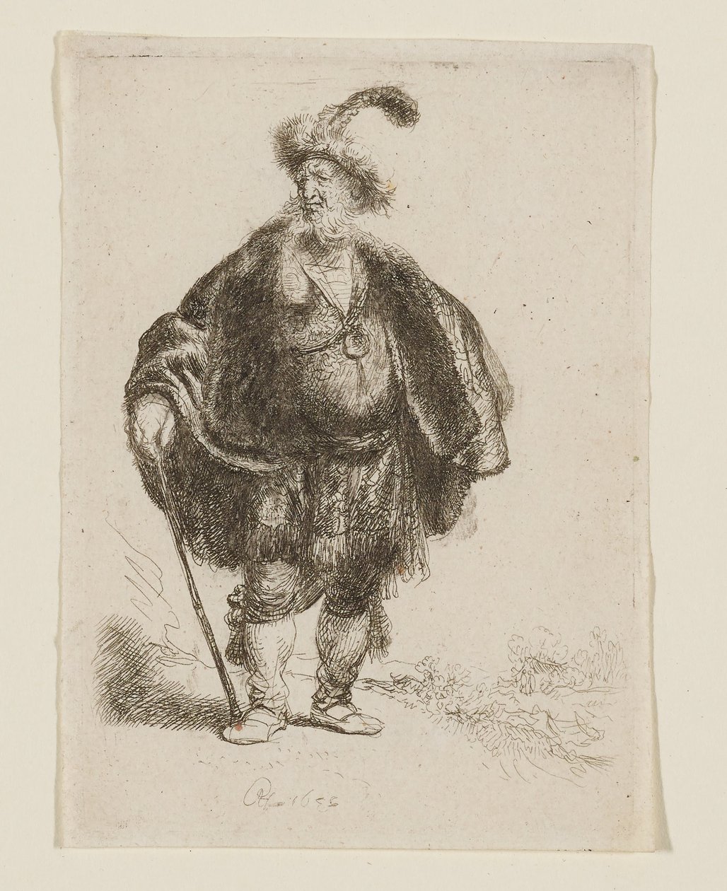 Stående man i orientalisk dräkt och pälsmössa med fjädrar av Rembrandt van Rijn