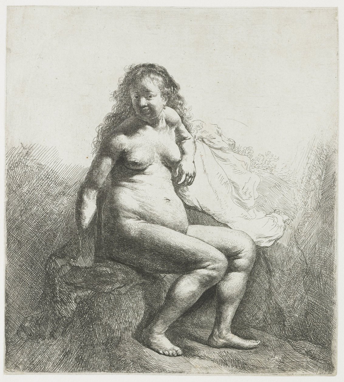 Naken kvinna på en kulle av Rembrandt van Rijn