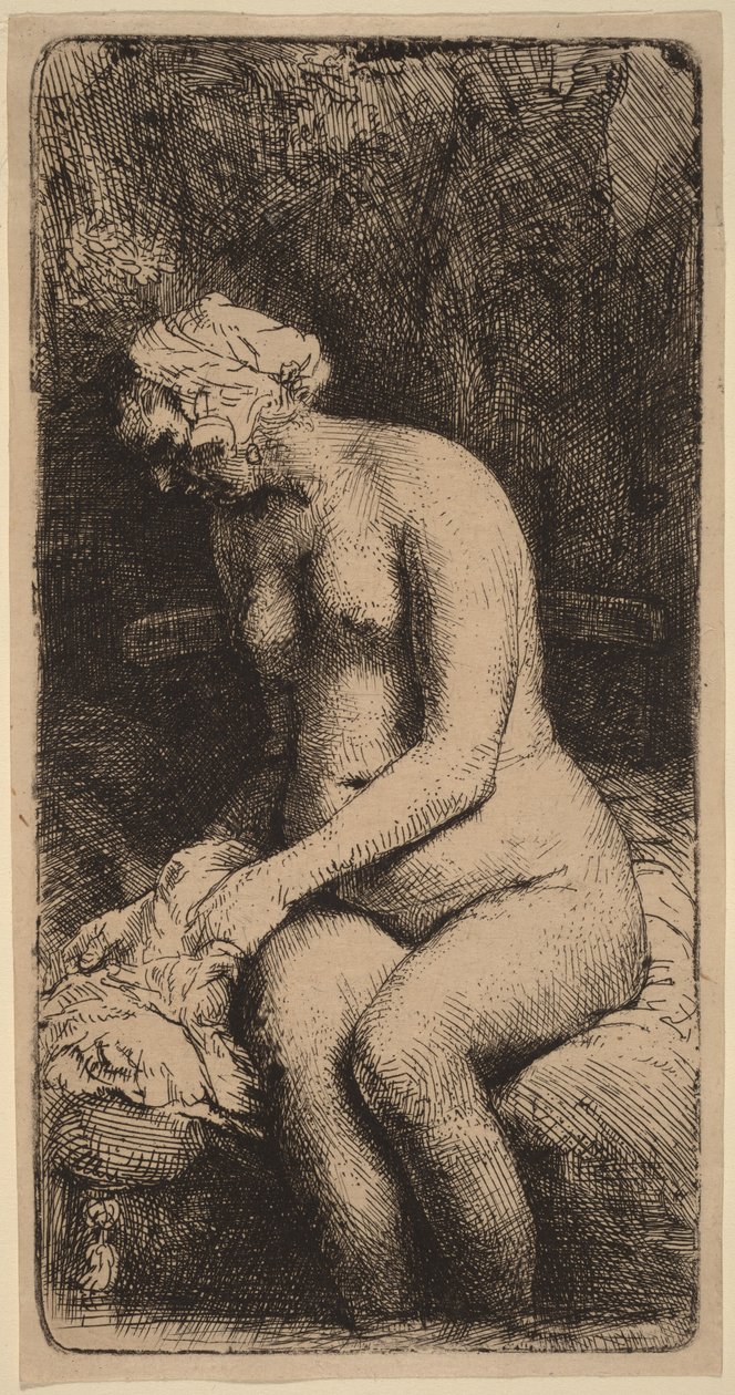 Naken kvinna sittande på en bänk med en kudde (Kvinna som tvättar fötterna vid en bäck) av Rembrandt van Rijn
