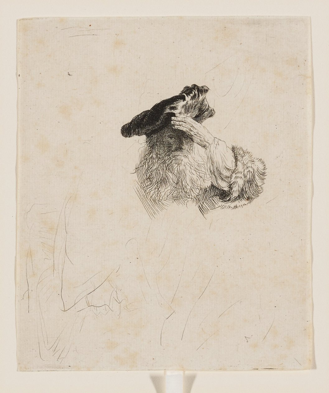 En gammal man som skärmar av solen med handen av Rembrandt van Rijn