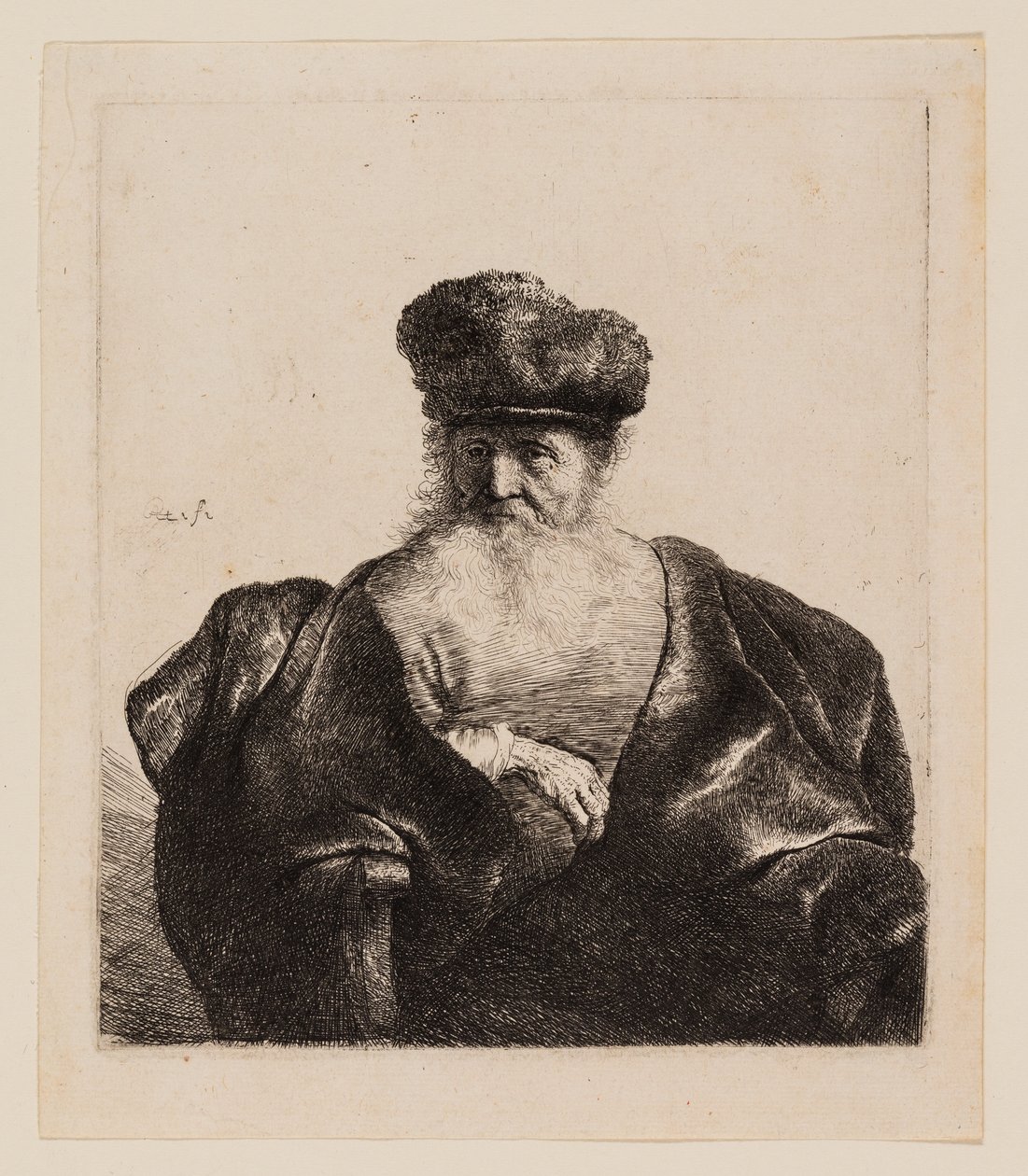 Gammal man med skägg, pälsmössa och sammetsmantel av Rembrandt van Rijn