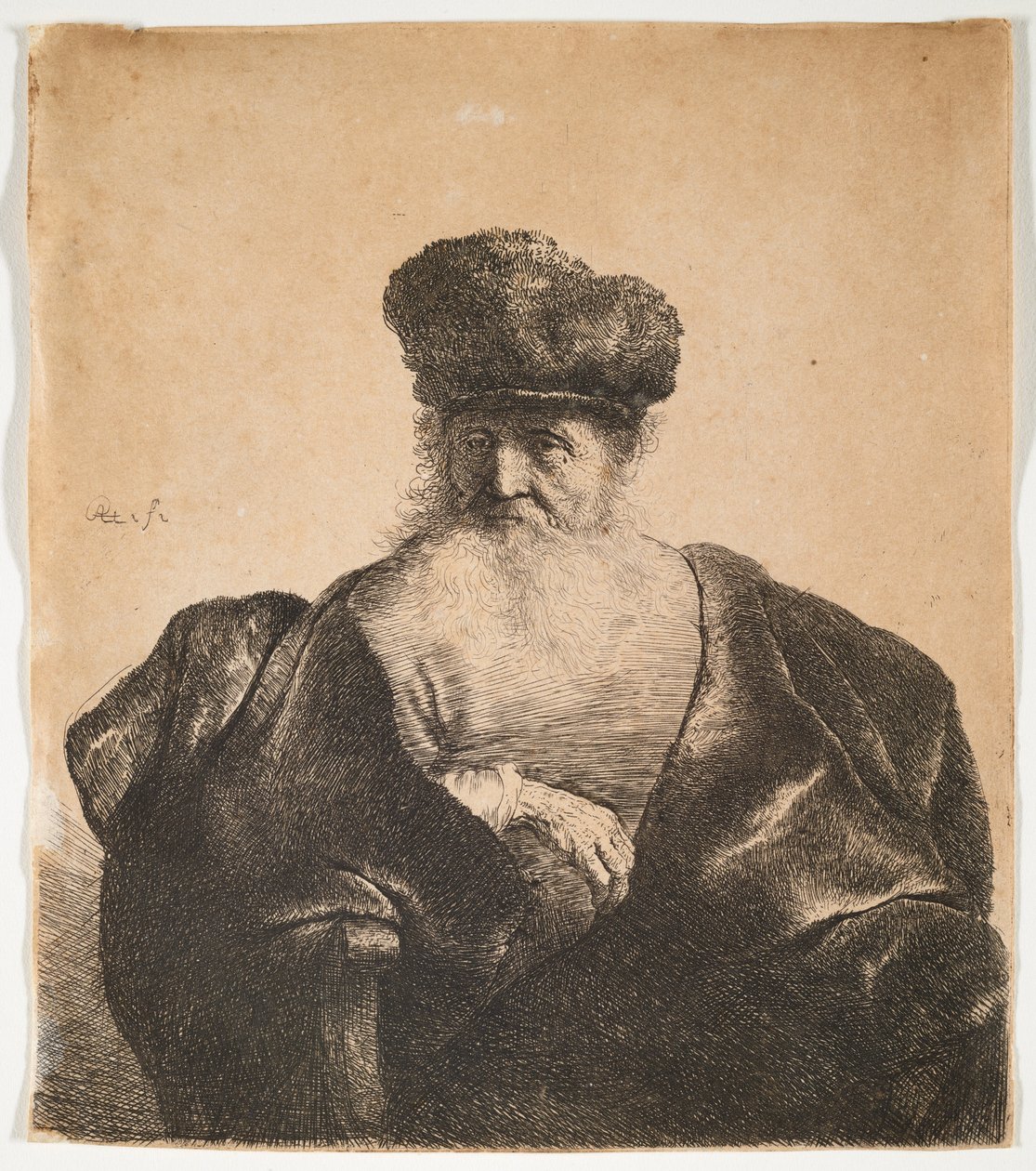 Gammal man med skägg, pälsmössa och sammetsmantel av Rembrandt van Rijn