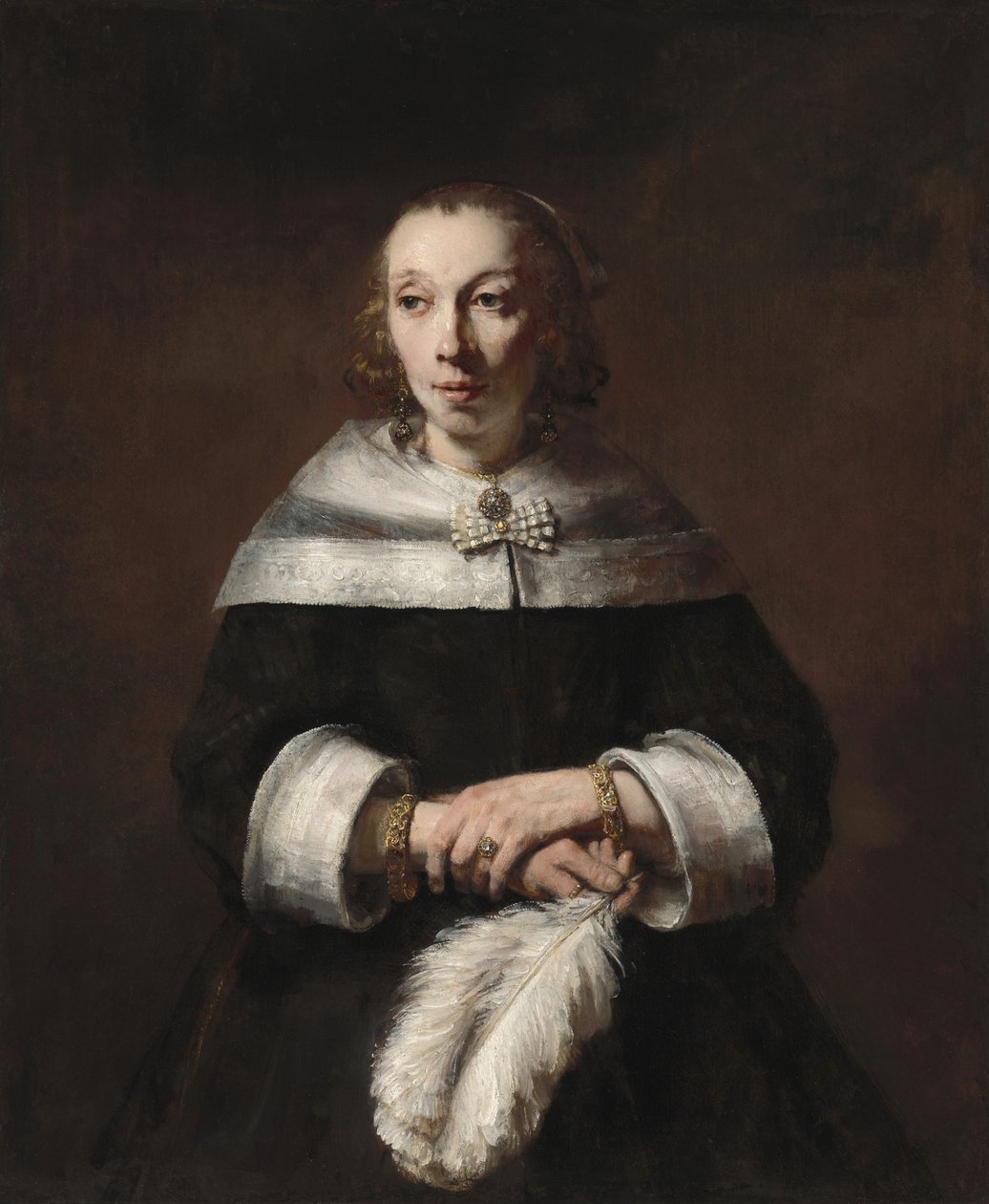 Porträtt av en kvinna med en strutsfjäderfläkt av Rembrandt van Rijn