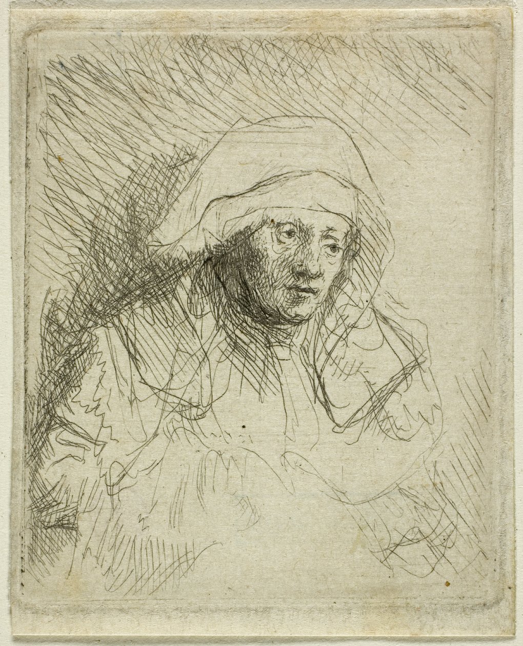 Sjuk kvinna med en stor vit huvudbonad (Saskia) av Rembrandt van Rijn