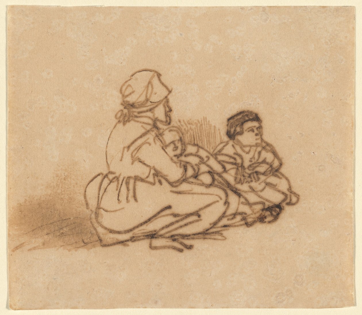 Kvinna som sitter på marken med två barn av Rembrandt van Rijn