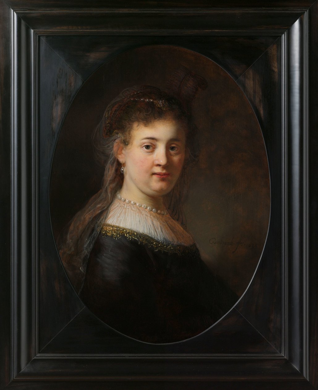 Ung kvinna i fantasidräkt av Rembrandt van Rijn