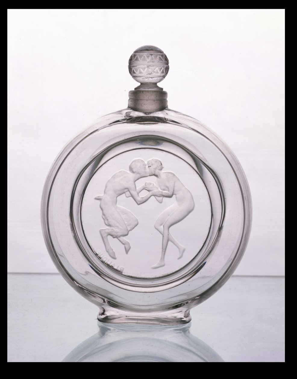 Le Baiser du Faune, doftflaska av klart glas för Molinard av Lalique av Rene Jules Lalique