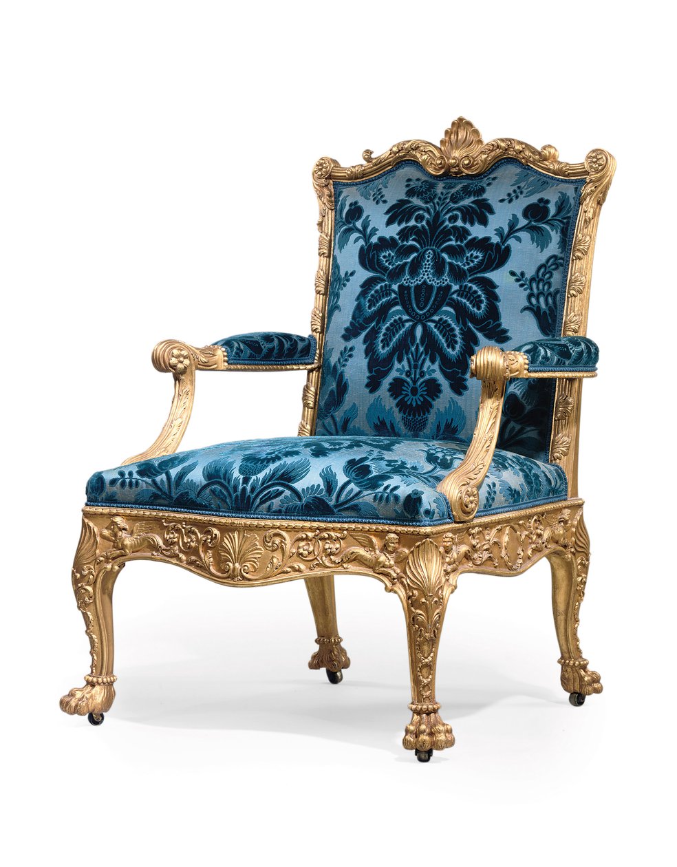 En av ett par George III fåtöljer i förgyllt trä av Robert Adam