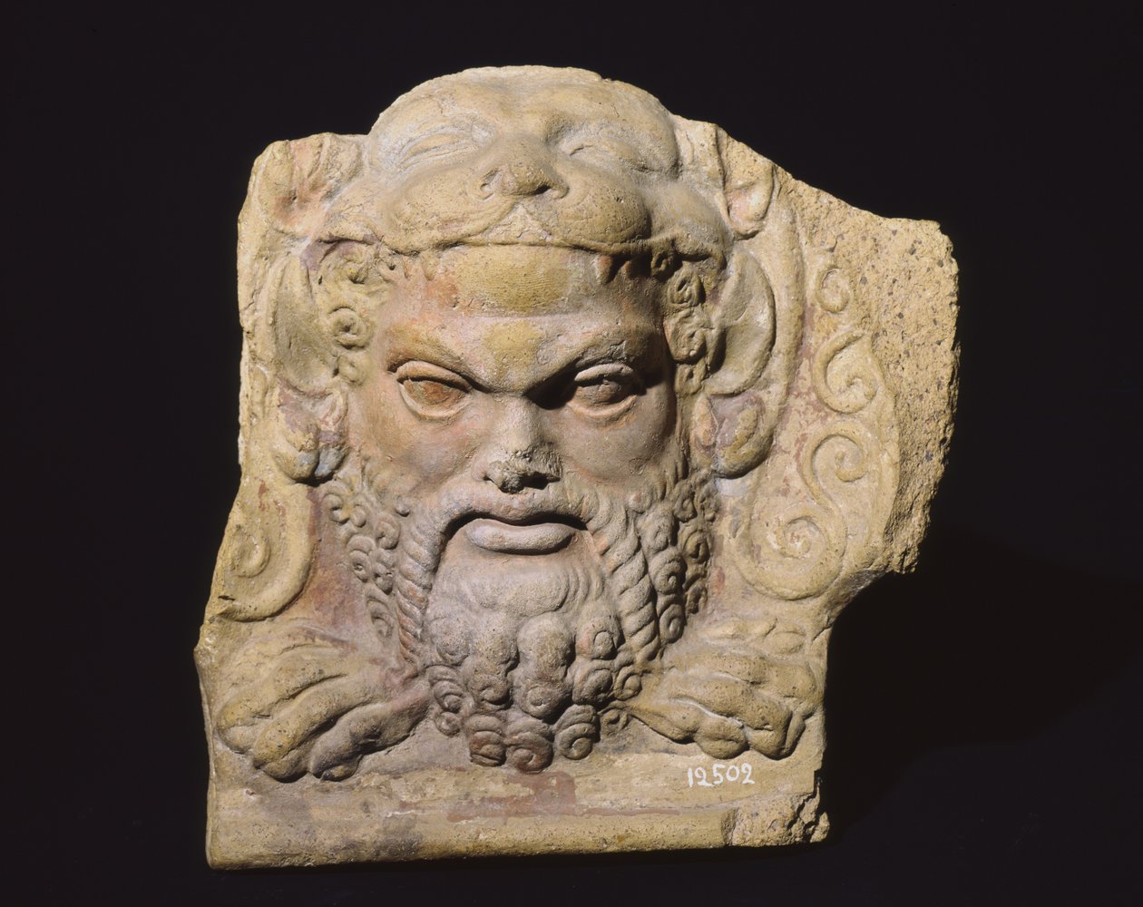 Antefix med ett människohuvud, från Sassi Caduti-templet i Falerii. av Roman