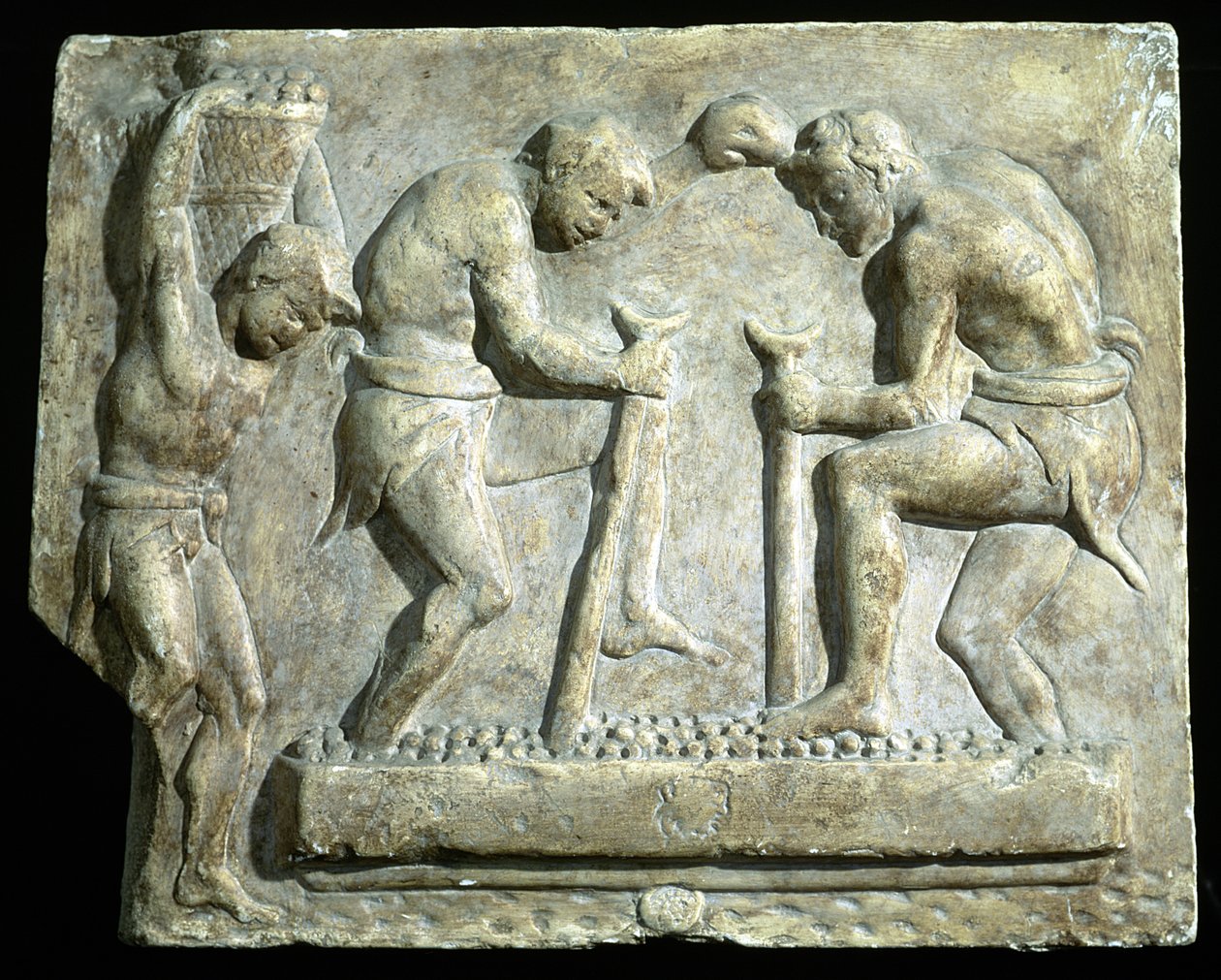 Relief med stenläggare av Roman
