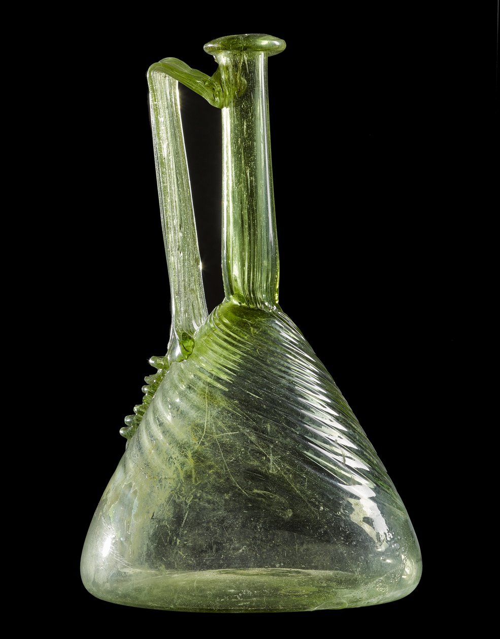 Flagon, från Brackenbraes, Turriff, Aberdeenshire (blåst grönt glas) av Roman