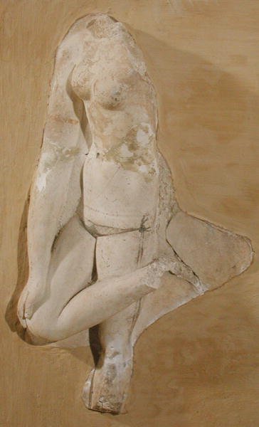 Relief föreställande en kvinnas kropp, Tunisien (stuckatur) av Roman