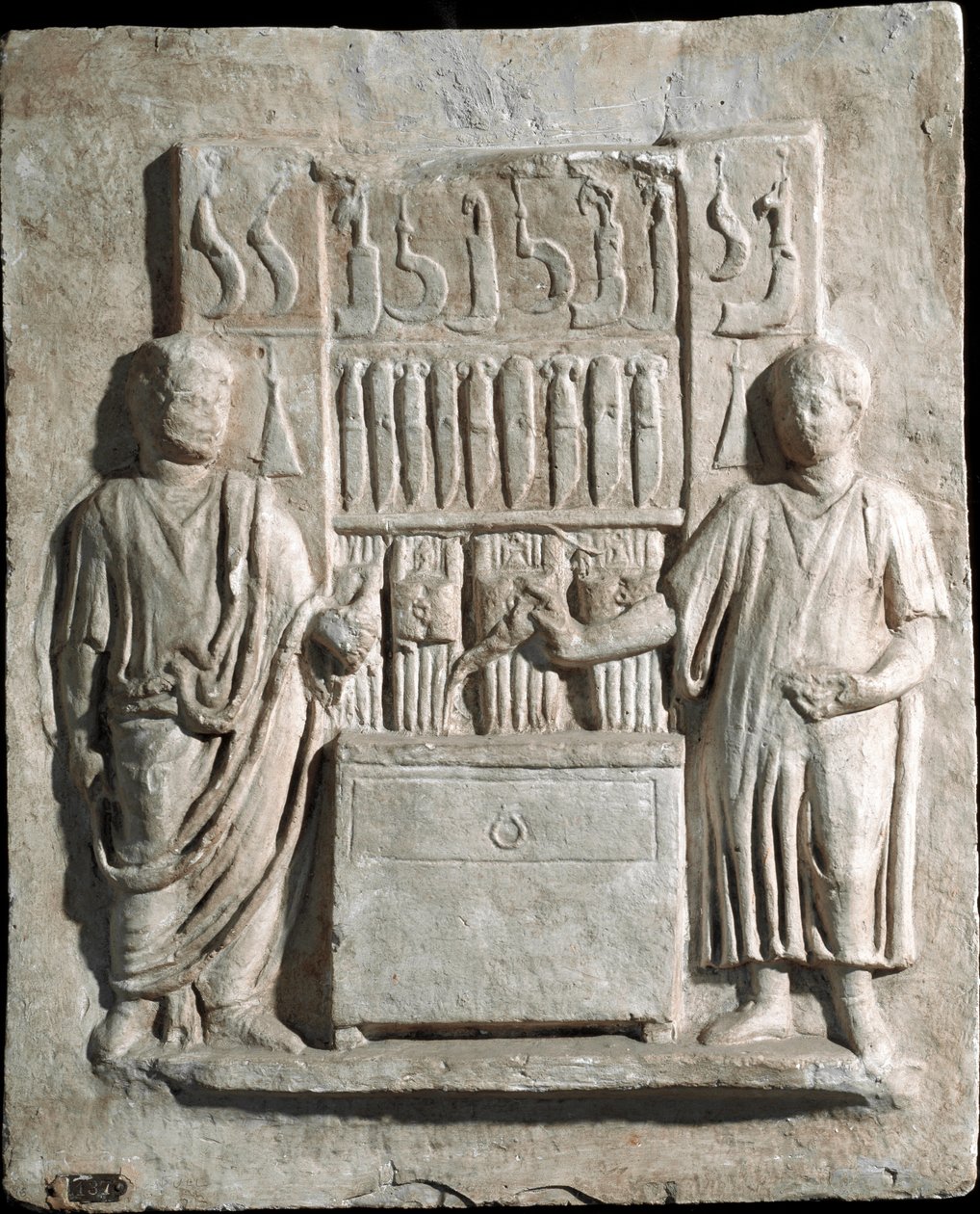 Romersk konst: lågrelief av begravningsstelen av Lucio Cornelio Atimeto, bestick. 1:a århundradet e.Kr. Från Villa Massimo, Rom. Rom, museum för romersk civilisation av Roman