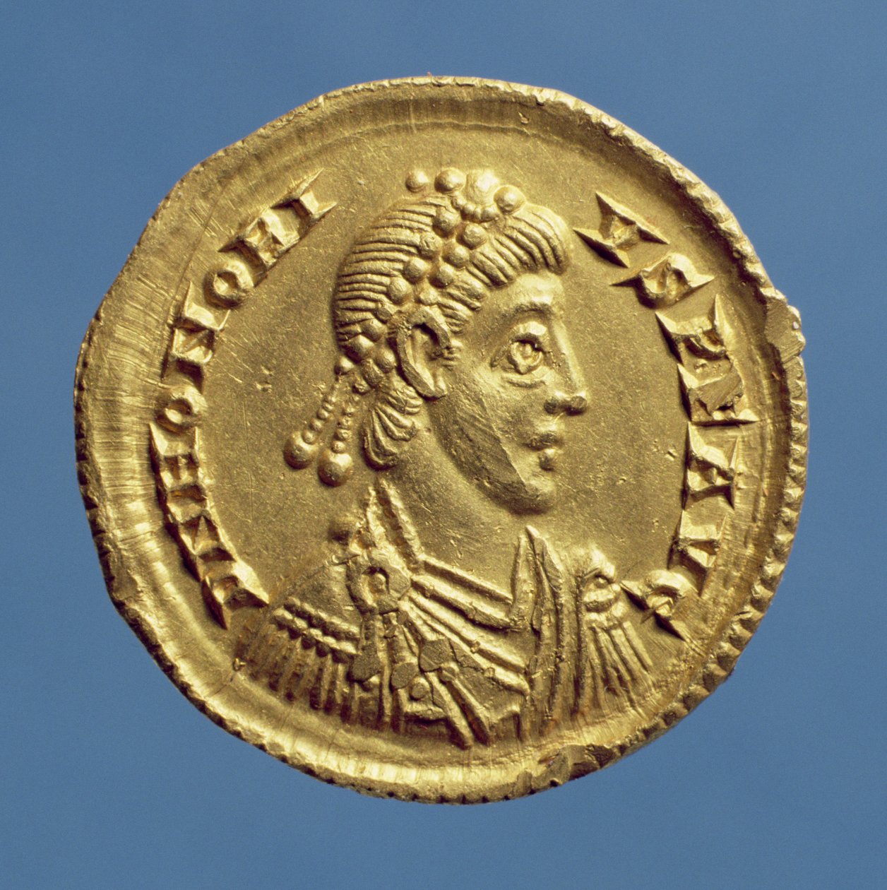 Solidus (framsidan) av Honorius (393-432) draperier, cuirassed, bärande ett diadem. Inskription: D N HONORIVS P F AVG (guld) av Roman