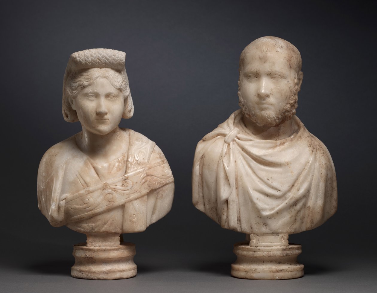 Porträttbyst av en aristokratisk man och porträttbyst av en aristokratisk kvinna, c.270-280 (marmor) av Roman Imperial Period