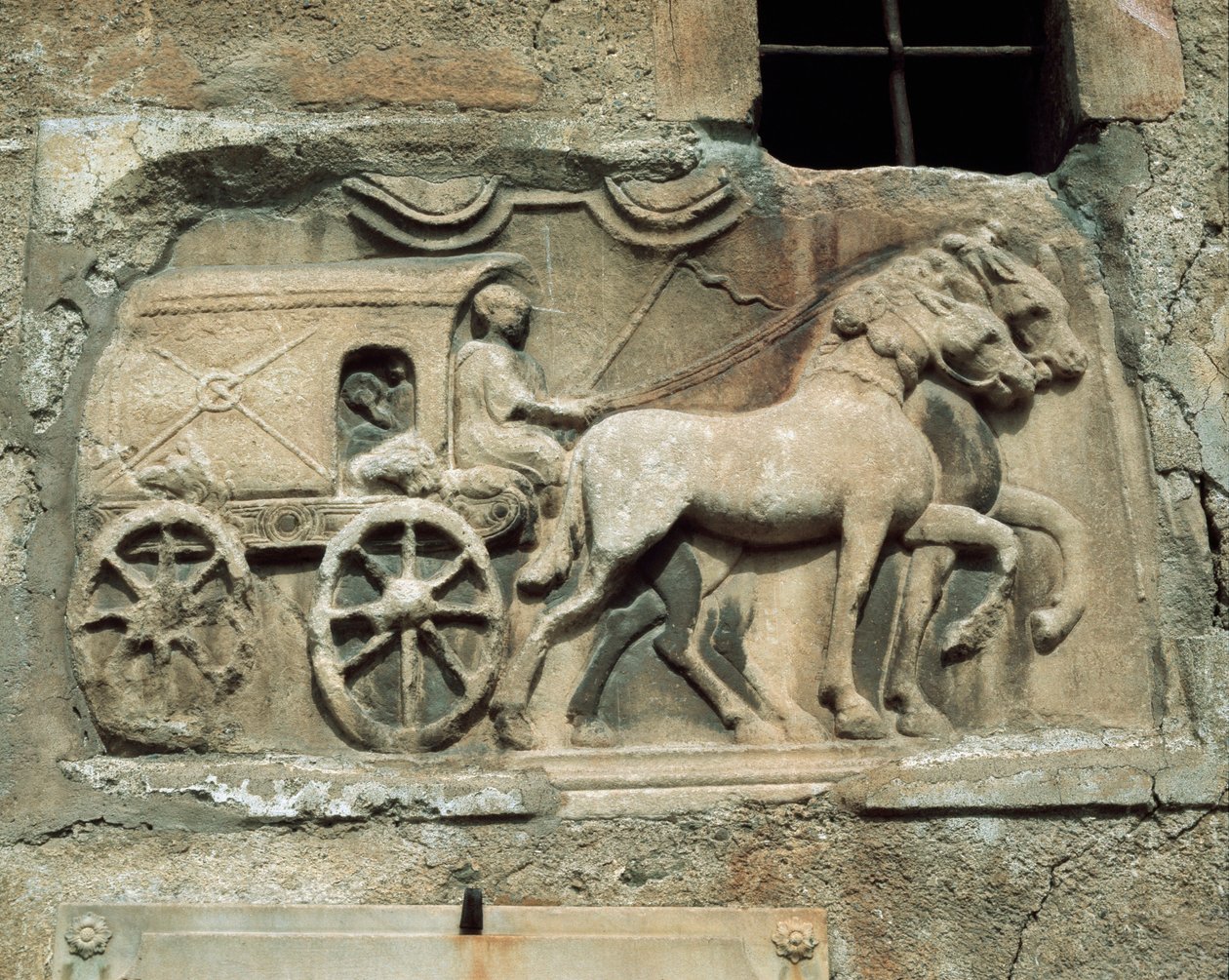 Vagn (till underjorden?) från en romersk grav, idag på södra väggen i bykyrkan Maria Saal av Roman Roman
