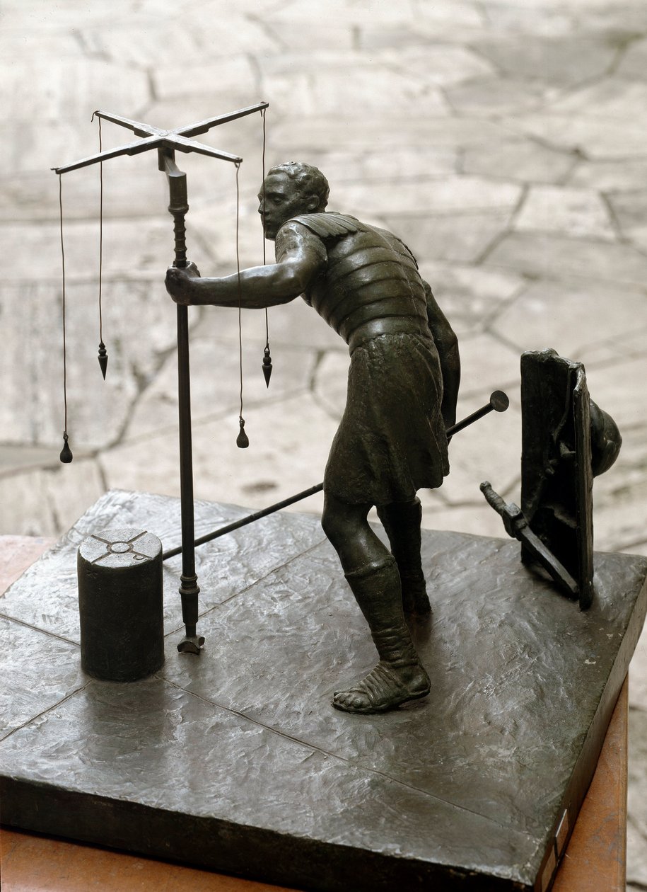 Romersk konst: "" gromatikern"" En lantmätare (agrimeners) mäter landet med hjälp av en groma (gruma). Bronsskulptur. Rom, museum för romersk civilisation av Roman Roman