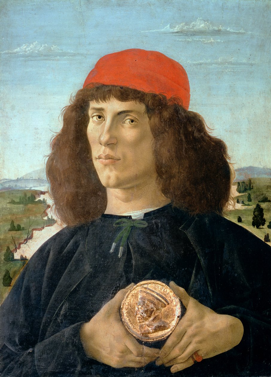 Porträtt av en ung man som håller en medaljong av Cosimo I de