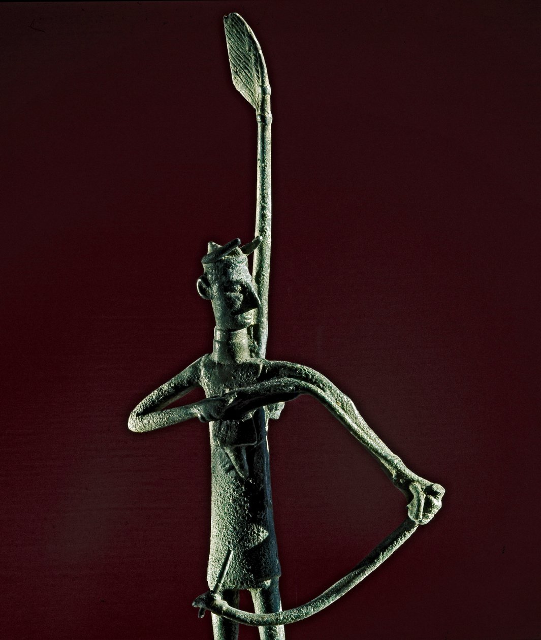 Nuragisk kultur (nuraghi) Sardinian: statyett av krigare som drar en bronsbåge. 700-talet f.Kr. Cagliari, National Archaeological Museum, Sardinien, Italien av Sardinia Nuragic Civilization