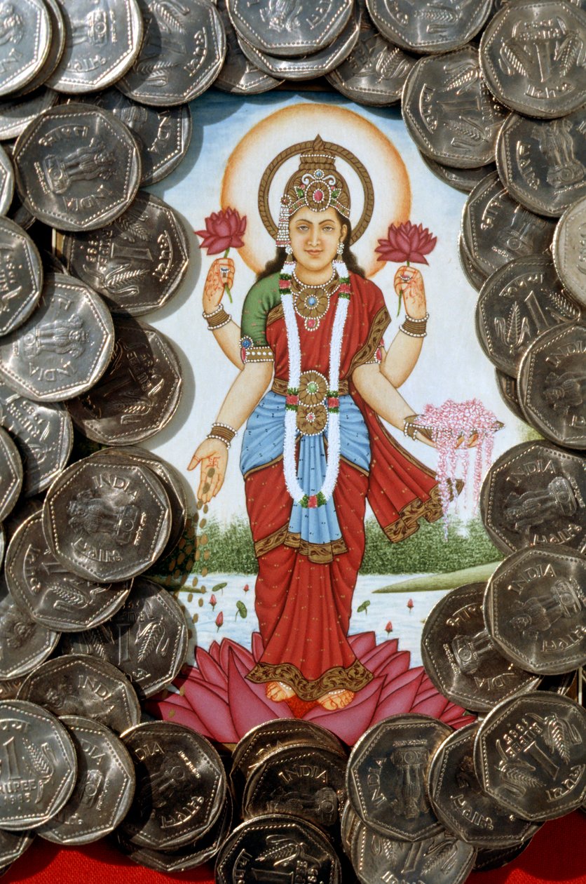 Gudinnan Lakshmi och enrupiemynt av School Indian