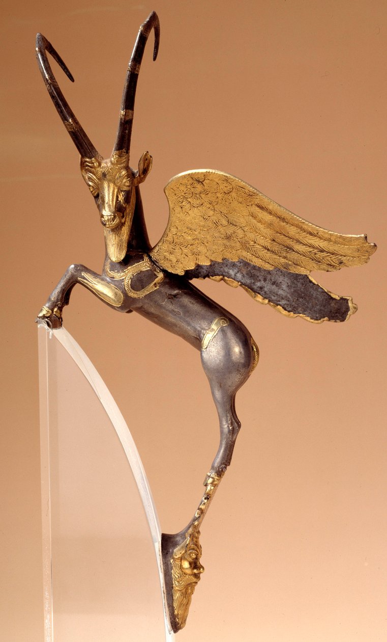 Apparathandtag: silvervingebock, infällt, guld. Persiska perioden routenide (6:e-4:e århundradet f.Kr.), kommer från Iran. Paris, musee du Louvre - Ceremoniellt handtag: bevingad stenbock i silver, inläggning, guld. Achaemenidiska persiska perioden (6:e-4: av School Persian