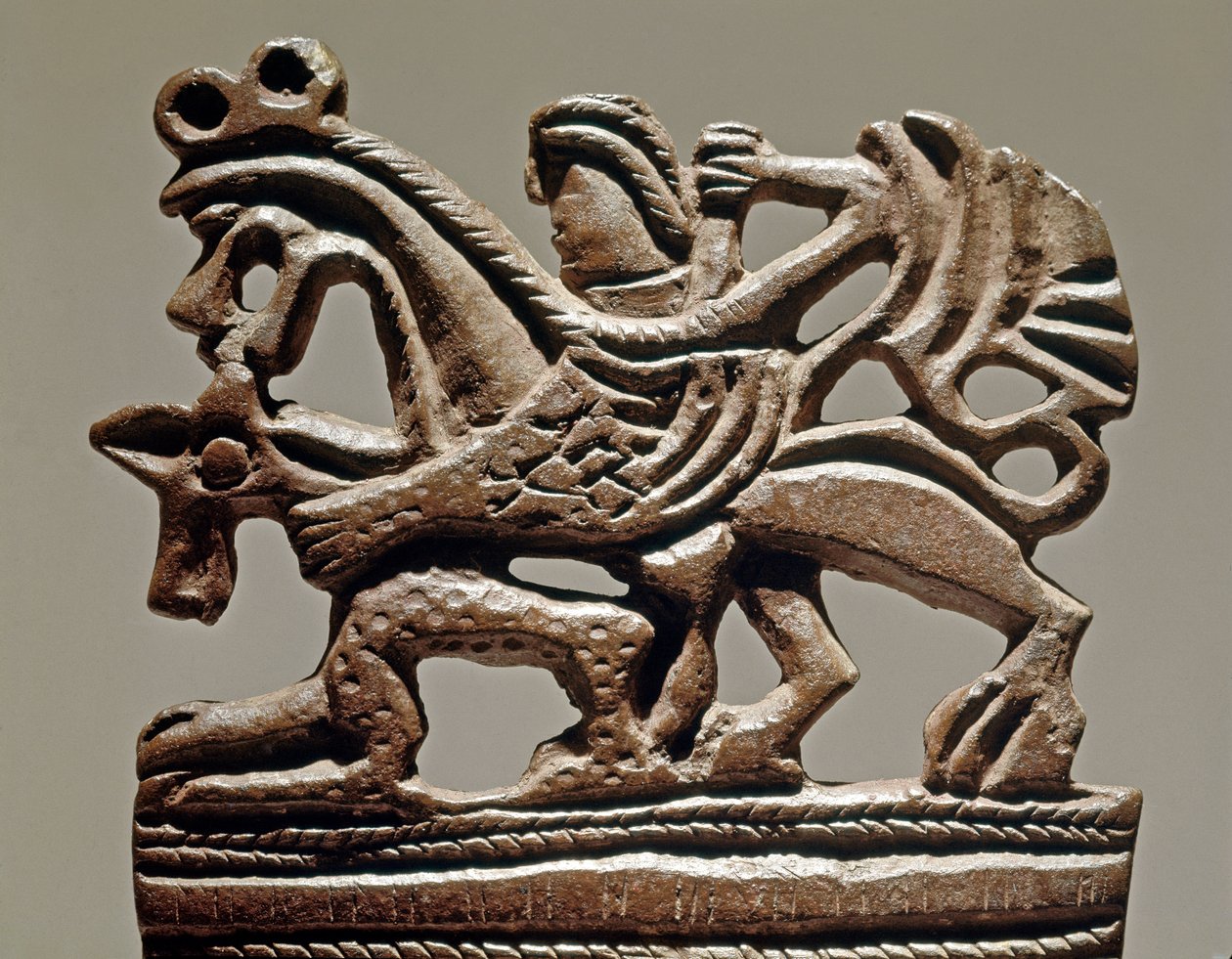 Art Scythian (skytisk eller skytisk civilisation): Apollo på en griffin - 300-talet f.Kr. - Tankprydnad i brons - Eremitagemuseet, Sankt Petersburg av Scythian