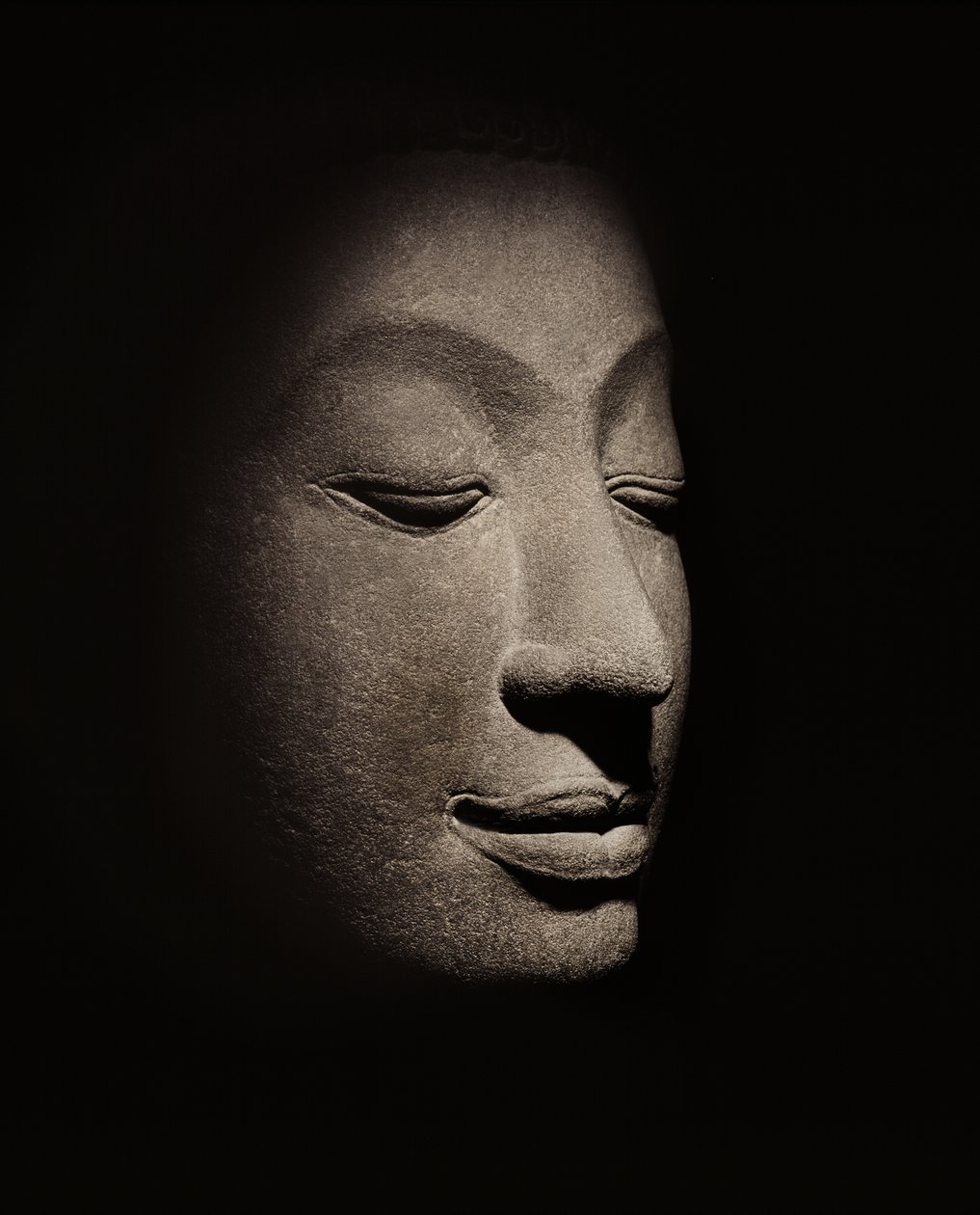 Buddhahuvud från den tidiga Ayutthayaperioden av Siamese School