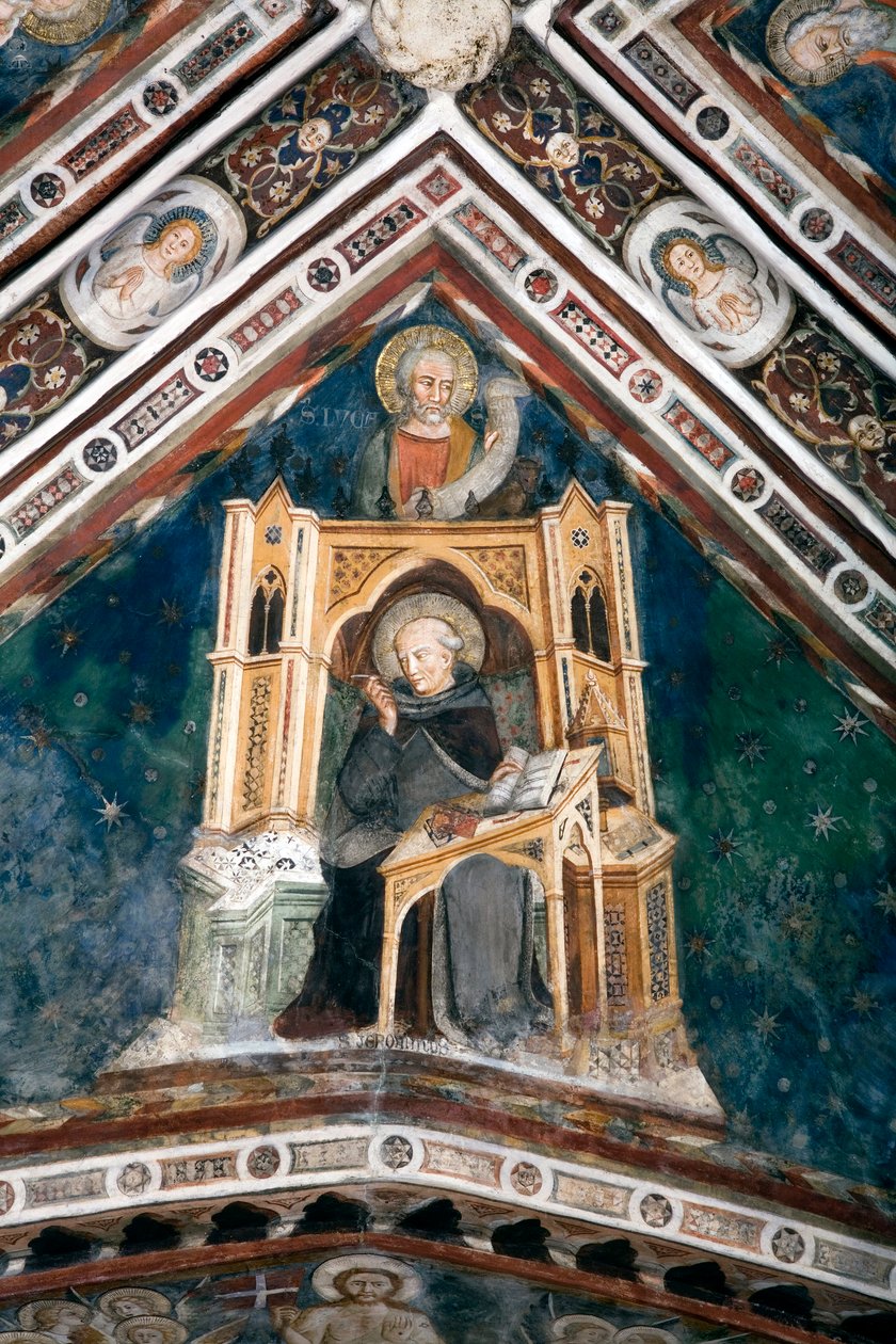 Utsikt över detaljerna i en fresk som dekorerar ett av övre kyrkans valv som representerar de fyra läkarna i den romerska kyrkan: Saint Hieronymus och evangelisten Saint Luke. gjord av skolan i Siena från början av 1300-talet. Kloster av av Sienese School
