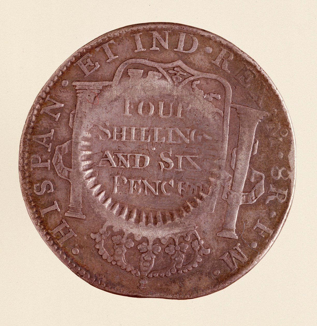 Silvermynt (8 realer) från Spanien: Karl III:s regeringstid (1759-1788). 1777 med motstämpel av 1787. Diam. 3,9 cm Neapel, museo archeologico av Spanish School