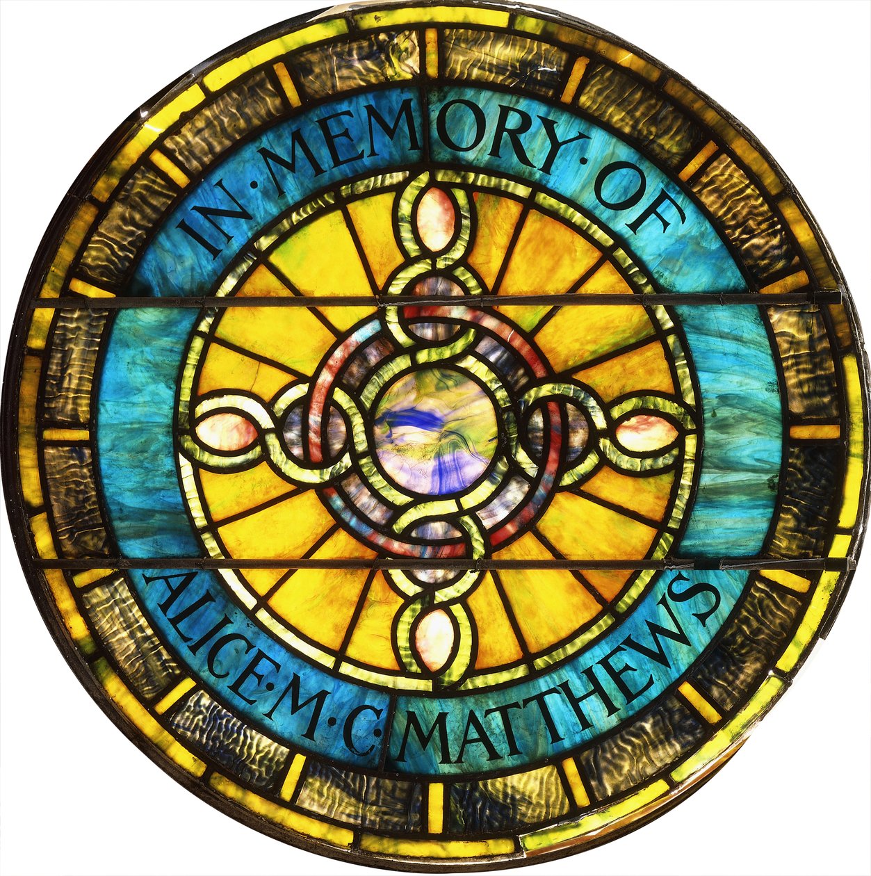 Ett cirkulärt blyat glasfönster av Tiffany Studios (blyat glas) av Studios Tiffany
