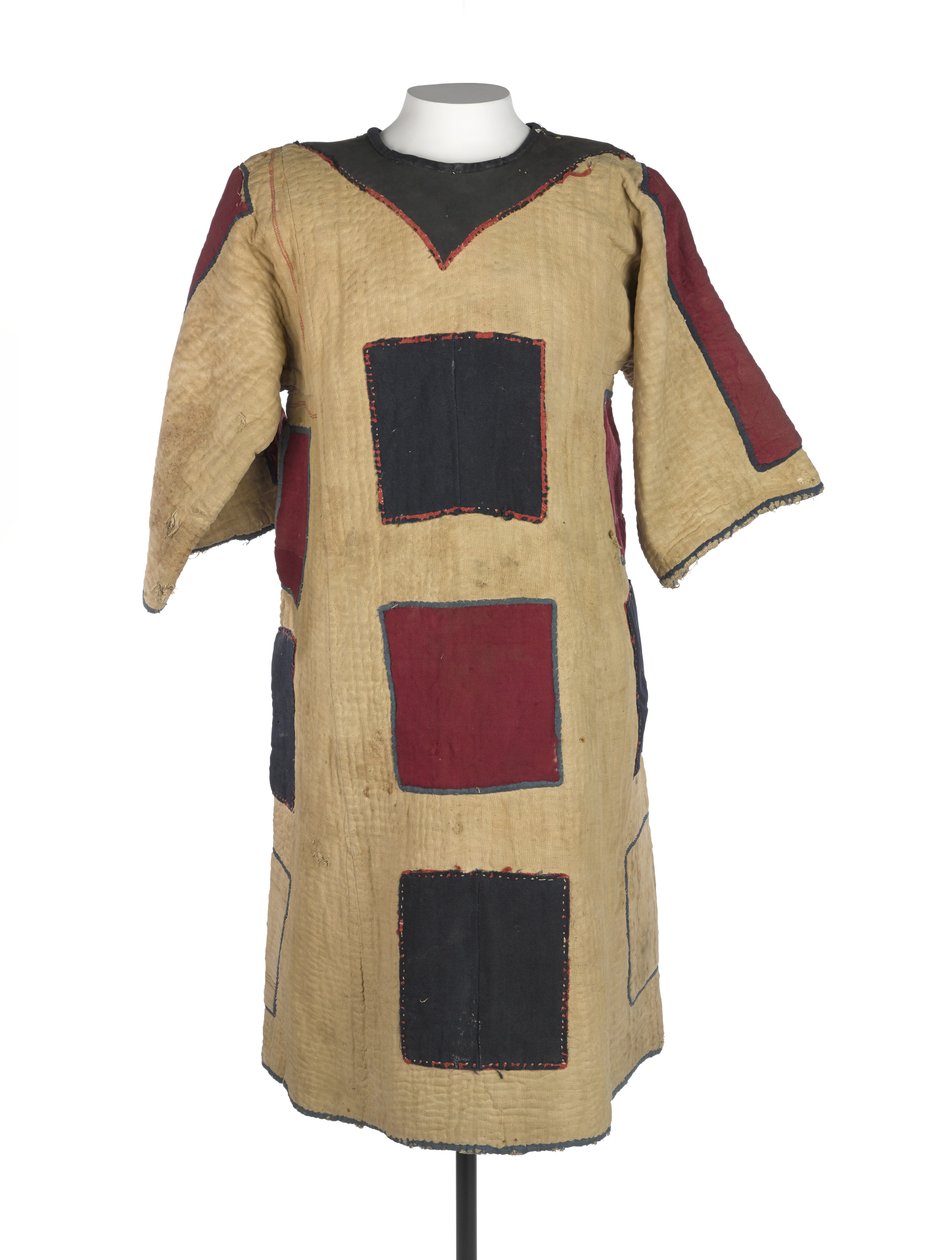 En av två dervischjibbahs som bärs av Wad El Nejumi och hans son, ca 1887 (textil) av Sudanese School