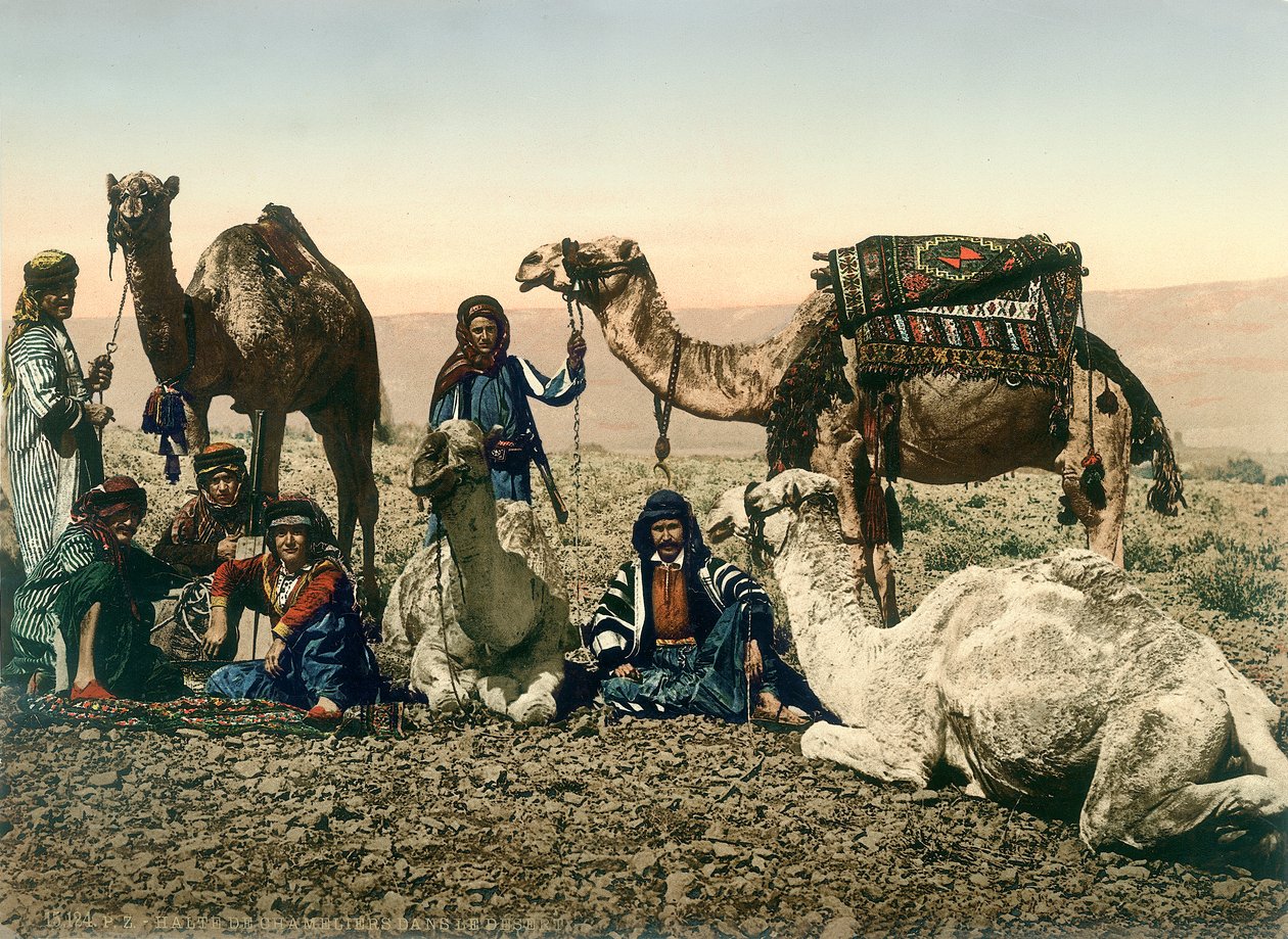 Västerländska resenärer utklädda till beduiner och deras guider med sina kameler i Jordandalen, ca 1880-1900 (fotokrom) av Swiss Photographer