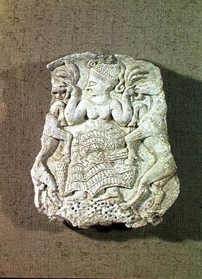 Lock på en pyxis föreställande djurens älskarinna som matar två vilda getter, ca 1200-1150 av Syrian Syrian