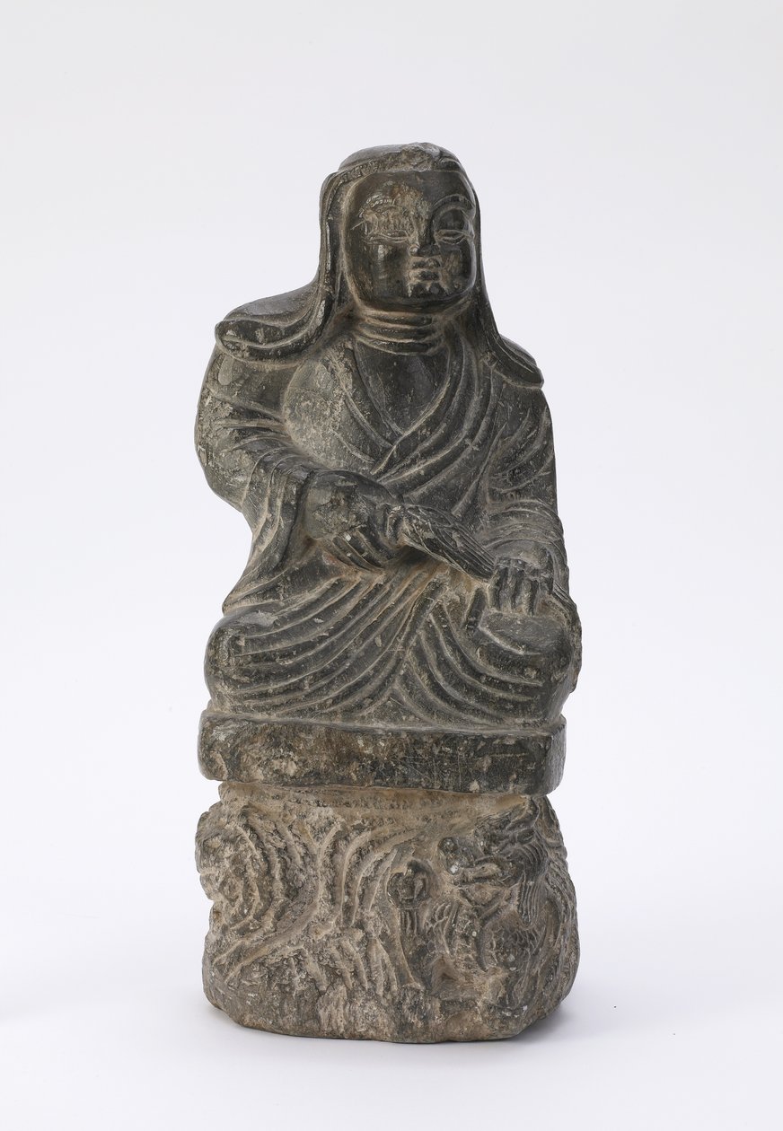 Liten staty av en buddhistisk präst av Tang Dynasty Chinese School